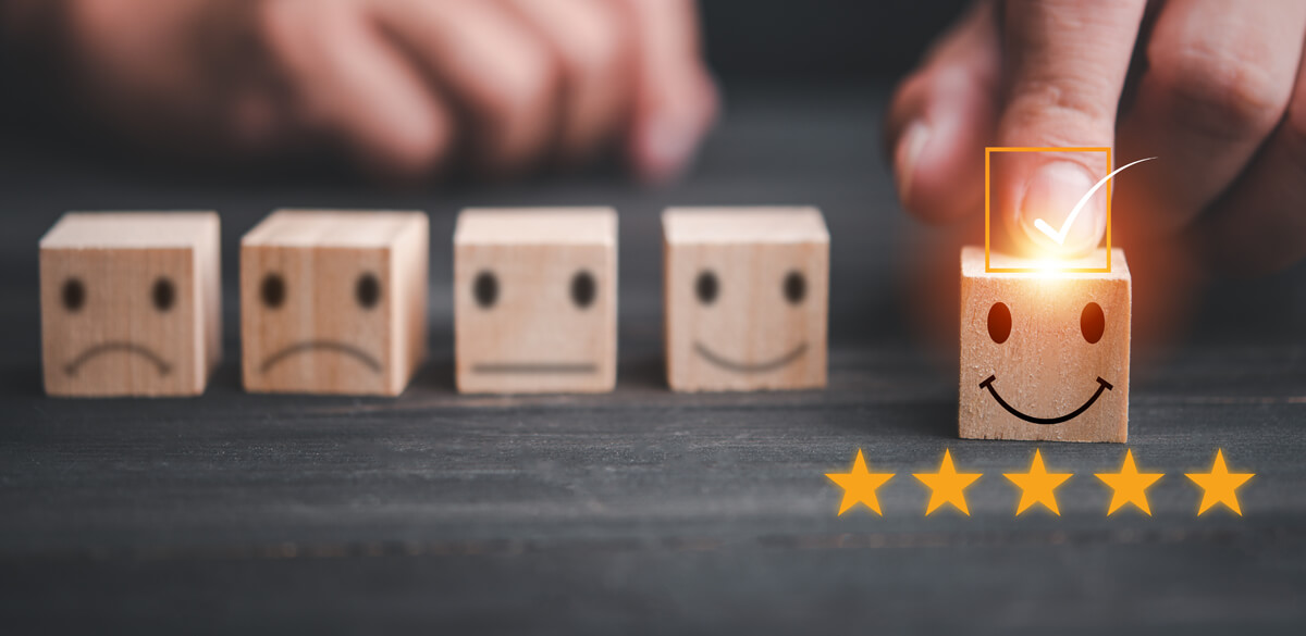 Happy faces on wooden blocks