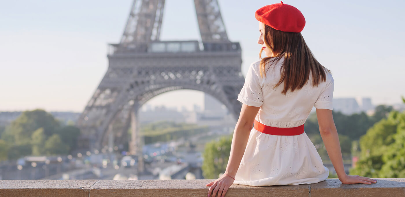 Women sat looking at Effiel Tower in Paris