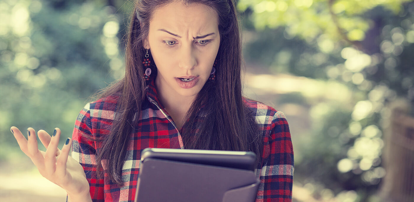 Unhappy women on a tablet